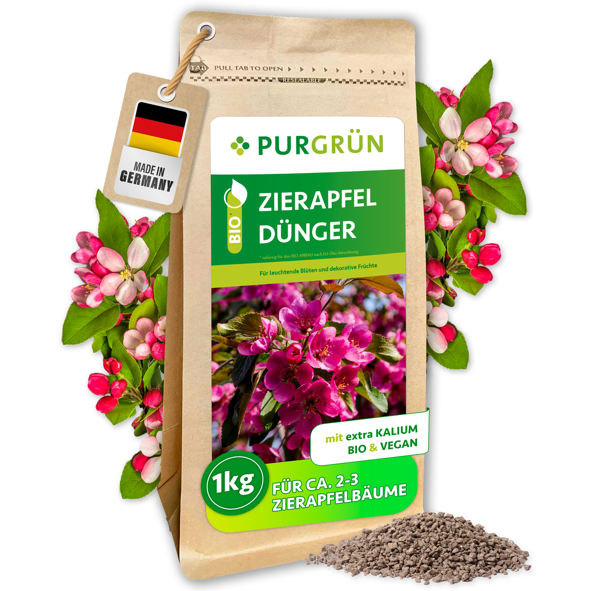Purgrün Bio-Zierapfel-Dünger im 1-kg-Standbeutel mit sichtbarem Granulat, rosa Zierapfelblüten und Anhänger „Made in Germany“.