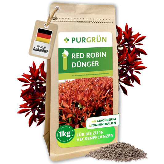 Packung Purgrün Red-Robin-Dünger, 1 kg, mit Granulat und roten Glanzmispelblättern sowie „Made in Germany“-Anhänger.