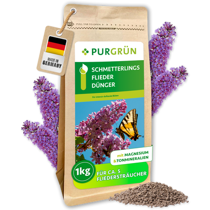 Purgrün Schmetterlingsflieder-Dünger, 1 kg, im wiederverschließbaren Papierbeutel mit sichtbarem Granulat.