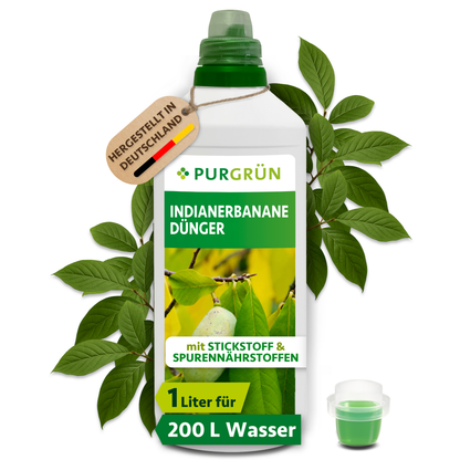 Purgrün Indianerbanane-Dünger in der 1-Liter-Flasche mit Dosierkappe und grünen Blättern; ausreichend für ca. 200 Liter Gießwasser.