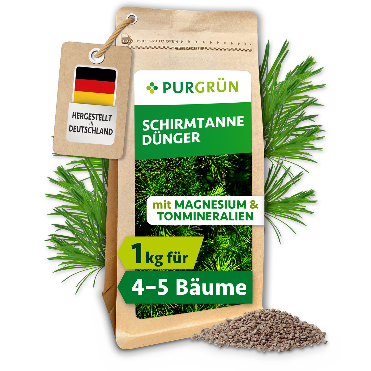 Purgrün Schirmtanne-Dünger im 1-kg-Beutel mit Magnesium und Tonmineralien, umgeben von Nadelzweigen und Granulat.